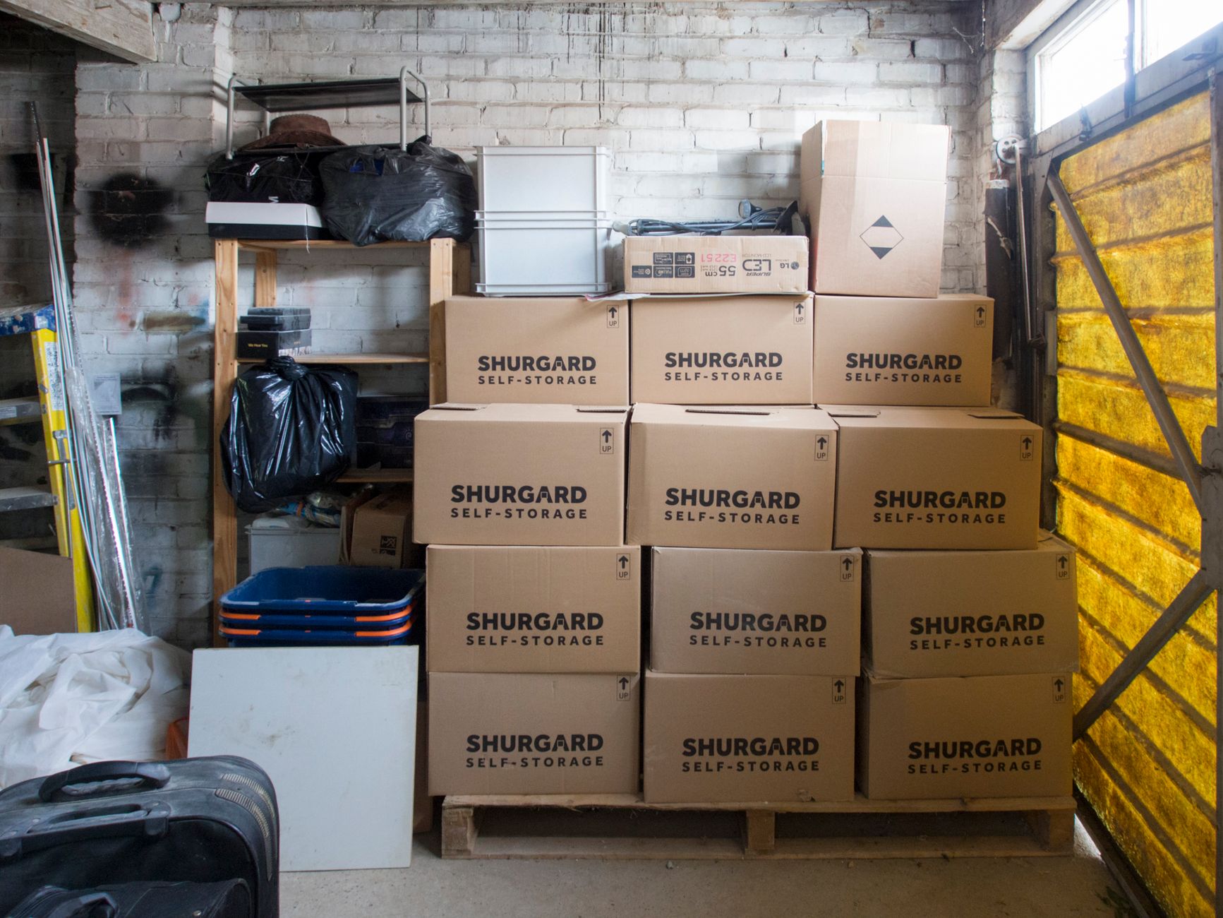 Stacked inventory boxes in a warehouse storage area